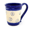 Coastal themed stoneware mug in Caribbean Blue with hand carved sand dollar design. 